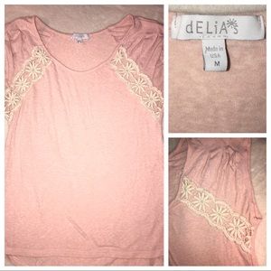 Delia’s pink top